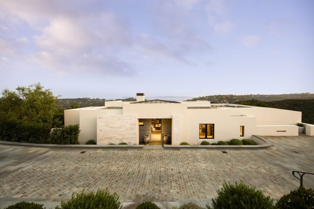 Back to the Future star Christopher Lloyd lists his \$6.4M Santa Barbara home with ocean views, sleek modern design, guest retreat, and seamless indoor-outdoor living.