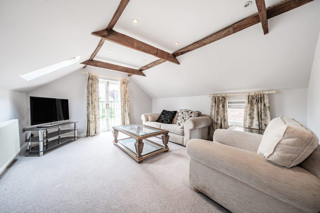 The former Georgian home of Formula One boss Colin Crabbe is for sale at £800,000 featuring elegant period details, annex suites, a walled garden and a swim spa.