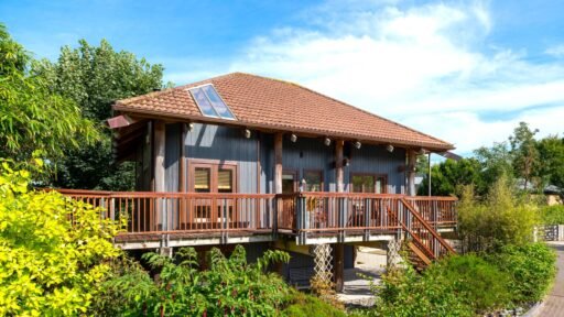 Kate Winslet’s former Japanese-style Pole House in Cornwall is for sale at £600,000, featuring unique stilt design, vaulted ceilings, gardens and coastal charm.