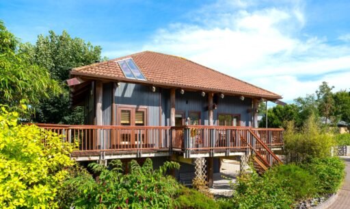 Kate Winslet’s former Japanese-style Pole House in Cornwall is for sale at £600,000, featuring unique stilt design, vaulted ceilings, gardens and coastal charm.