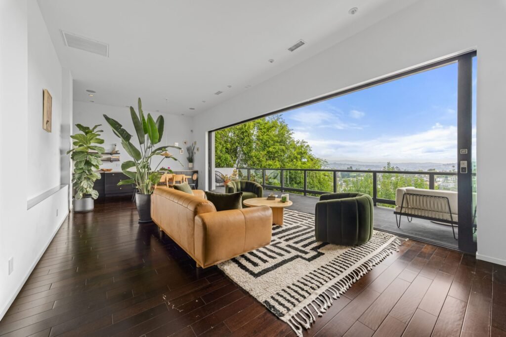Kristen Wiig’s former Los Feliz home is now for rent at \$12,000 a month, offering Hollywood Hills views, luxe interiors, a spa, cinema and hotel-style terrace.