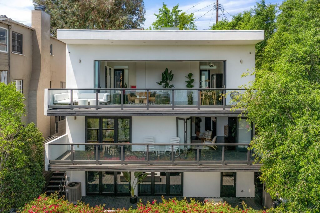 Kristen Wiig’s former Los Feliz home is now for rent at \$12,000 a month, offering Hollywood Hills views, luxe interiors, a spa, cinema and hotel-style terrace.