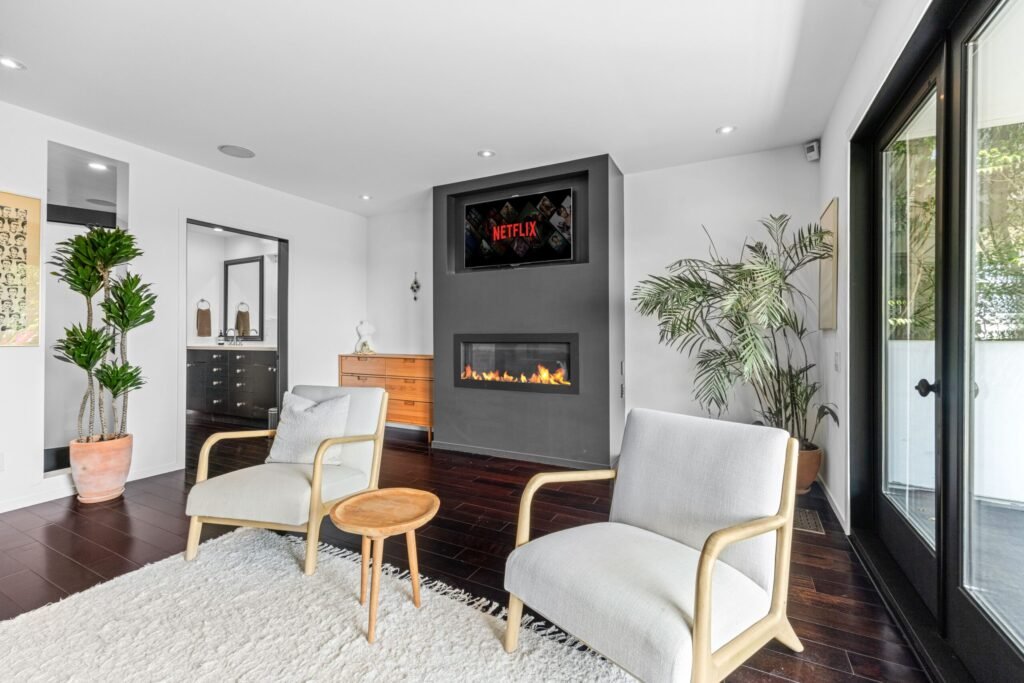 Kristen Wiig’s former Los Feliz home is now for rent at \$12,000 a month, offering Hollywood Hills views, luxe interiors, a spa, cinema and hotel-style terrace.