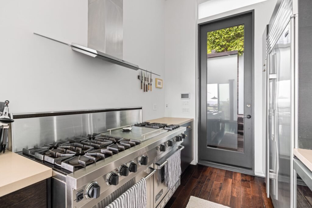 Kristen Wiig’s former Los Feliz home is now for rent at \$12,000 a month, offering Hollywood Hills views, luxe interiors, a spa, cinema and hotel-style terrace.