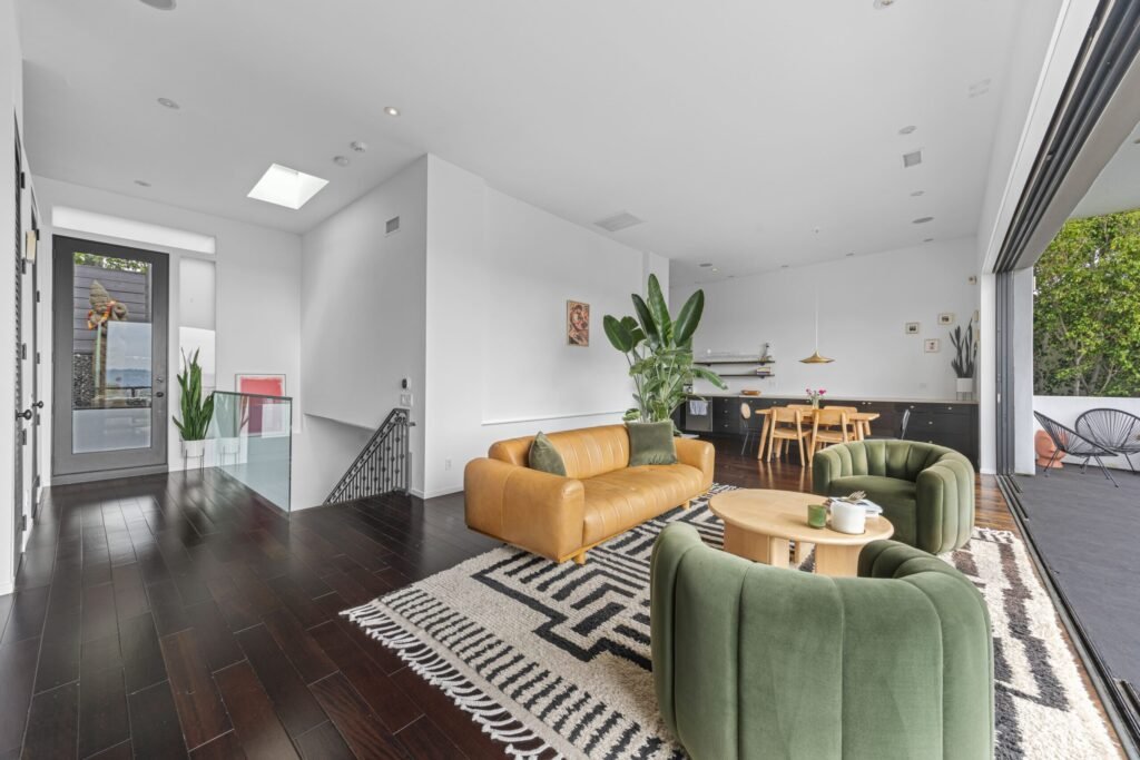 Kristen Wiig’s former Los Feliz home is now for rent at \$12,000 a month, offering Hollywood Hills views, luxe interiors, a spa, cinema and hotel-style terrace.