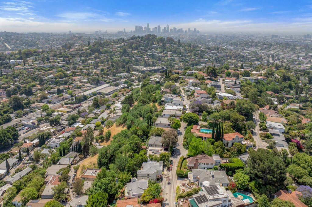 Kristen Wiig’s former Los Feliz home is now for rent at \$12,000 a month, offering Hollywood Hills views, luxe interiors, a spa, cinema and hotel-style terrace.