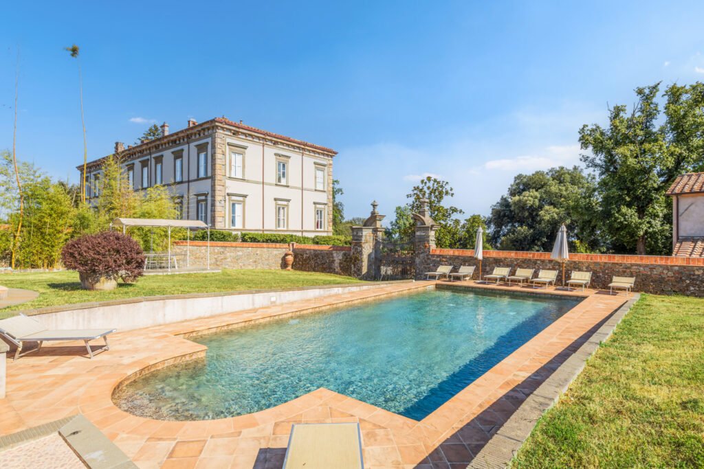 Tuscan villa near Lucca once owned by Napoleon’s sister hits the market with grand interiors, olive groves, pools, orangery, private chapel and rich historic charm.