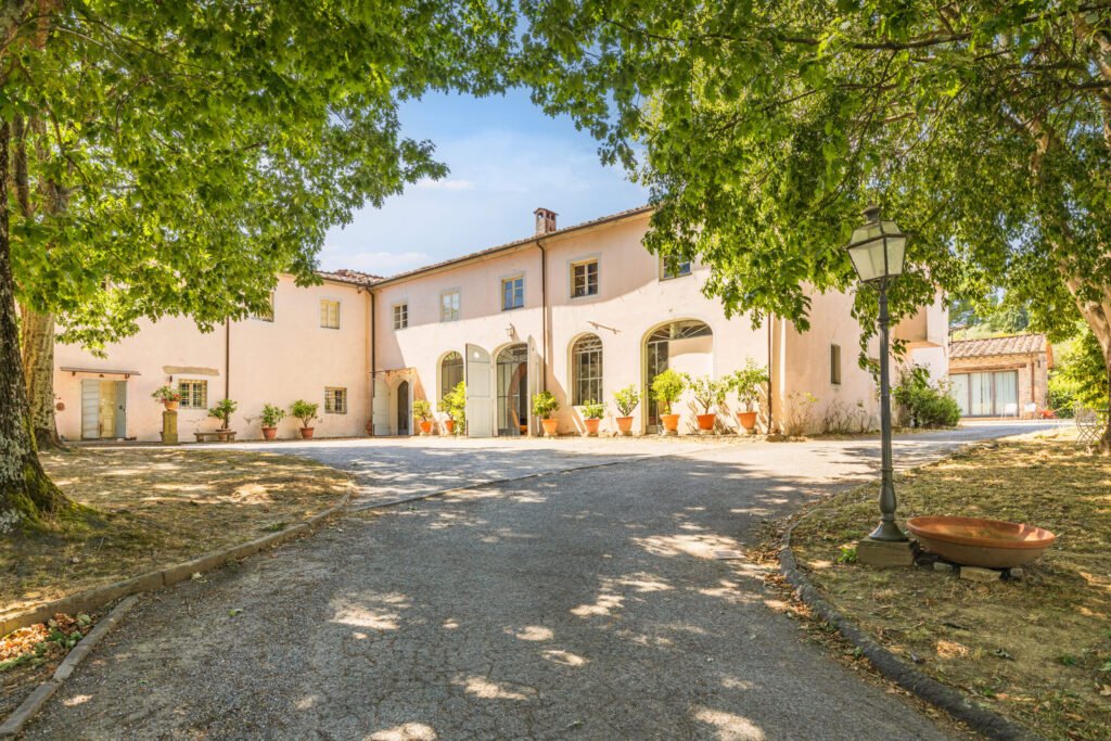 Tuscan villa near Lucca once owned by Napoleon’s sister hits the market with grand interiors, olive groves, pools, orangery, private chapel and rich historic charm.