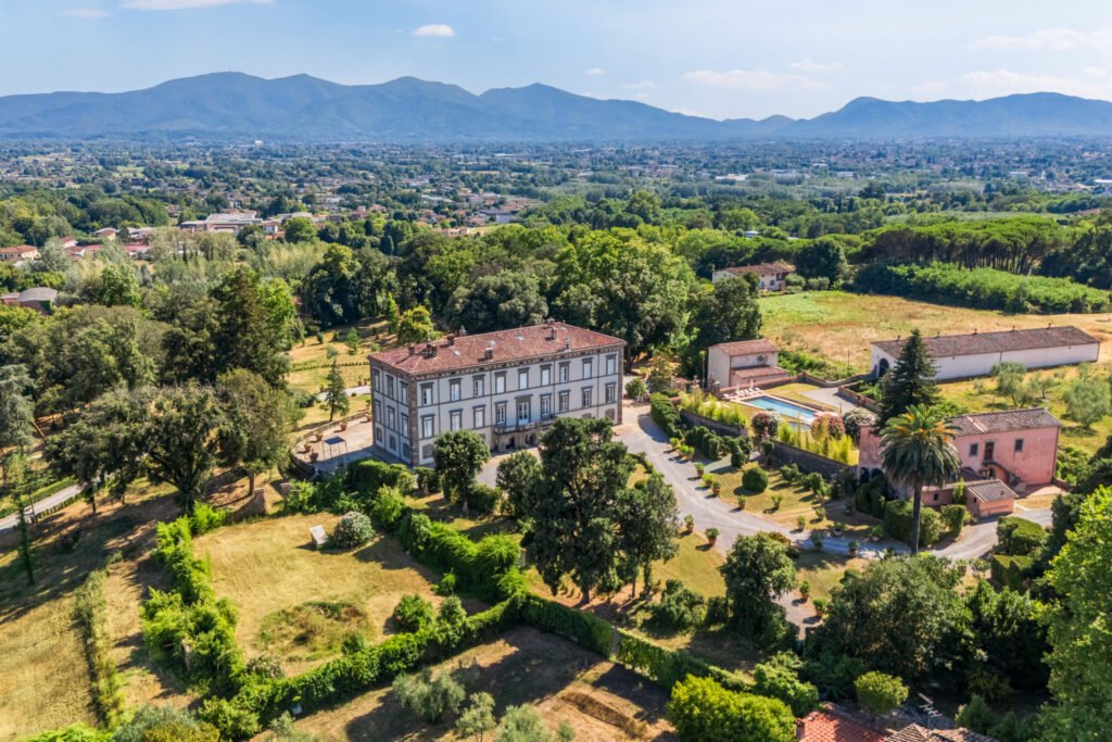 Tuscan villa near Lucca once owned by Napoleon’s sister hits the market with grand interiors, olive groves, pools, orangery, private chapel and rich historic charm.