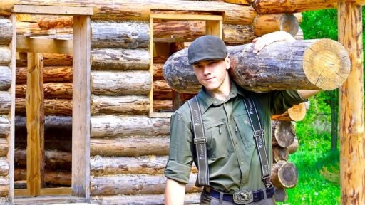 YouTuber Bjorn Brenton builds a forest cabin from scratch in Ukraine for under £3,000 using natural materials, documenting the year long journey of resilience and creativity.