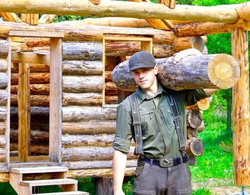 YouTuber Bjorn Brenton builds a forest cabin from scratch in Ukraine for under £3,000 using natural materials, documenting the year long journey of resilience and creativity.