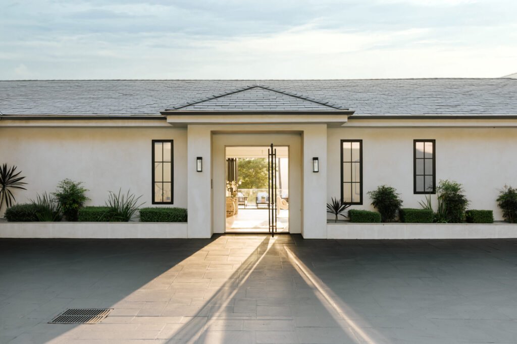 Mark Wahlberg’s former Beverly Hills estate is on the market for \$21.8M featuring seven bedrooms, luxury amenities, a grotto pool, guesthouse, gym and canyon views.