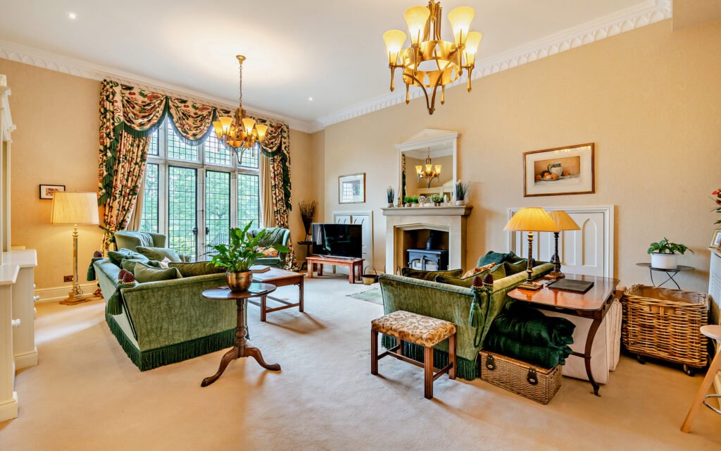 A £900,000 wing of historic Thurland Castle offers four beds, medieval features, cinema, tennis court, wine cellar, and landscaped gardens between the Lakes and Dales.