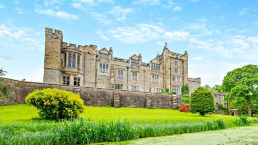A £900,000 wing of historic Thurland Castle offers four beds, medieval features, cinema, tennis court, wine cellar, and landscaped gardens between the Lakes and Dales.