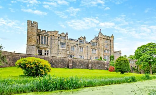 A £900,000 wing of historic Thurland Castle offers four beds, medieval features, cinema, tennis court, wine cellar, and landscaped gardens between the Lakes and Dales.