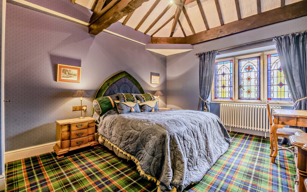 A £900,000 wing of historic Thurland Castle offers four beds, medieval features, cinema, tennis court, wine cellar, and landscaped gardens between the Lakes and Dales.