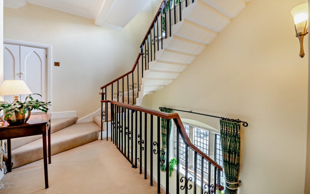 A £900,000 wing of historic Thurland Castle offers four beds, medieval features, cinema, tennis court, wine cellar, and landscaped gardens between the Lakes and Dales.