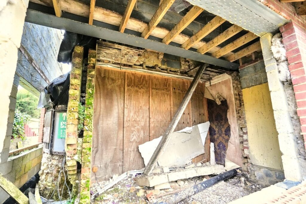 Mould-ridden four-bedroom house in Maidstone priced at £575k offers a risky renovation project with missing windows, rotting ceilings and a drained pool for investors.