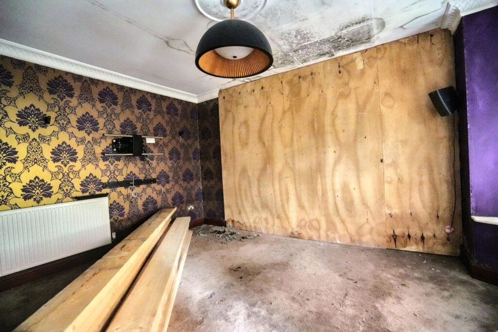 Mould-ridden four-bedroom house in Maidstone priced at £575k offers a risky renovation project with missing windows, rotting ceilings and a drained pool for investors.