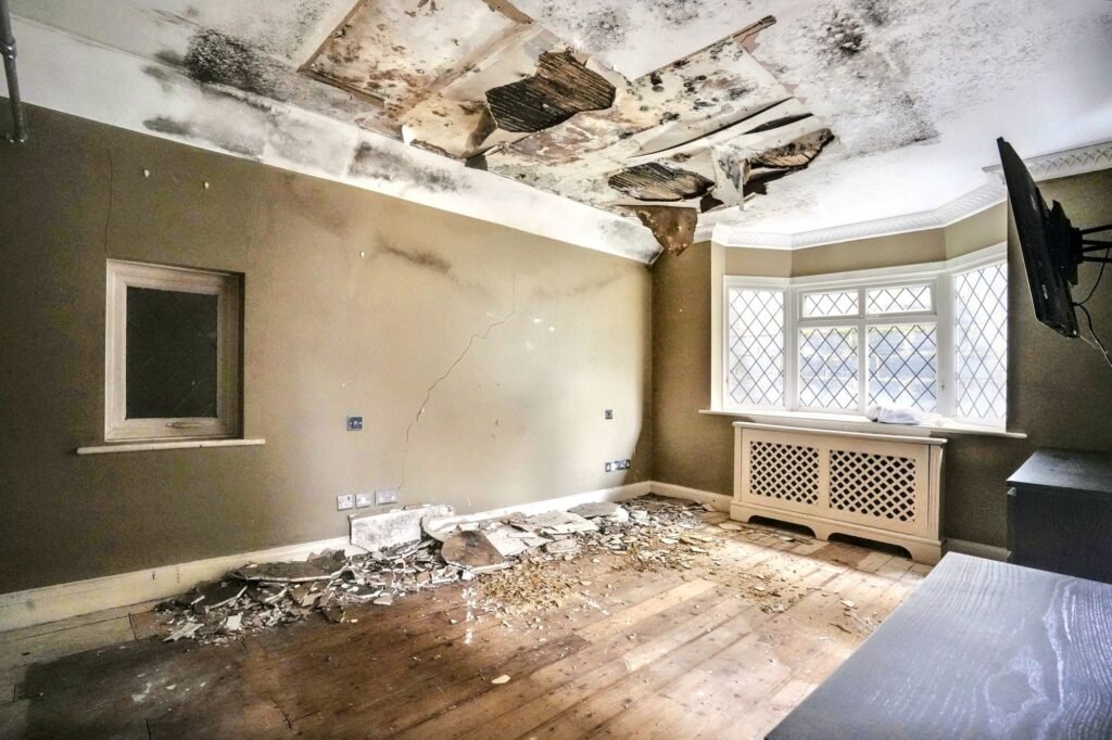 Mould-ridden four-bedroom house in Maidstone priced at £575k offers a risky renovation project with missing windows, rotting ceilings and a drained pool for investors.