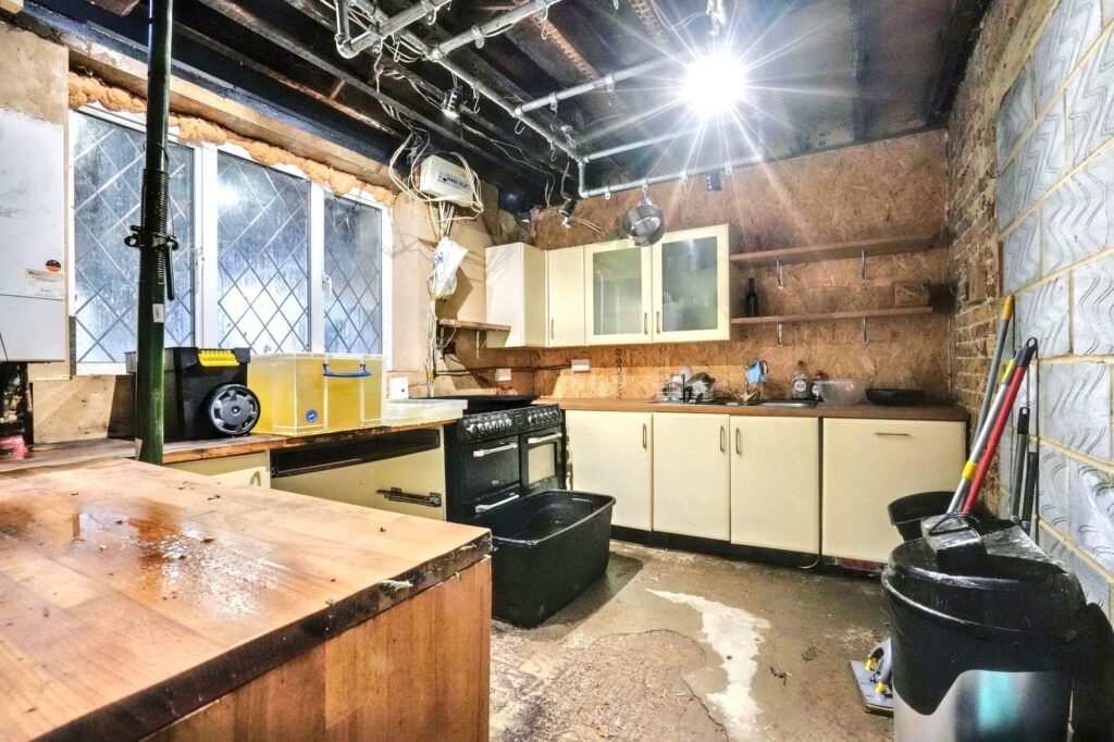 Mould-ridden four-bedroom house in Maidstone priced at £575k offers a risky renovation project with missing windows, rotting ceilings and a drained pool for investors.