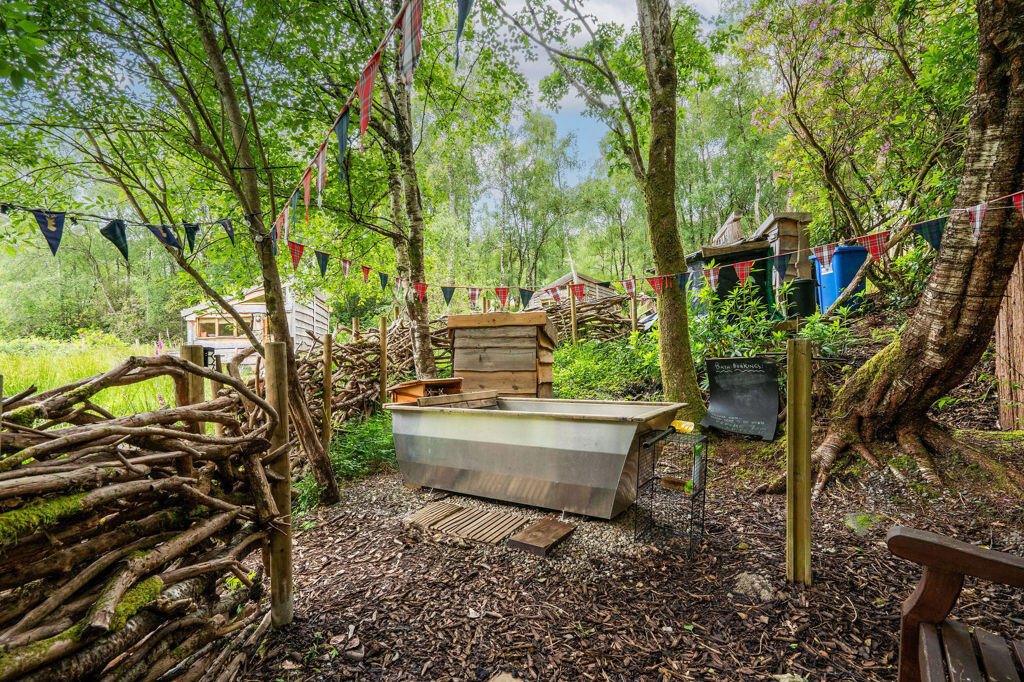 Three quirky eco cabins in Glenfinnan near the Harry Potter viaduct are for sale at £290,000 featuring handcrafted design, scenic views and a shared Swedish style outdoor bath.