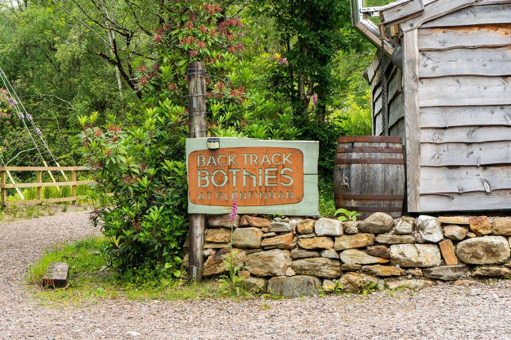 Three quirky eco cabins in Glenfinnan near the Harry Potter viaduct are for sale at £290,000 featuring handcrafted design, scenic views and a shared Swedish style outdoor bath.
