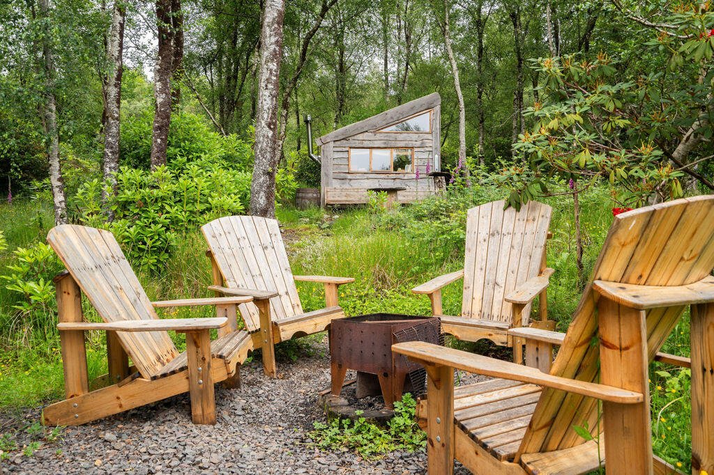 Three quirky eco cabins in Glenfinnan near the Harry Potter viaduct are for sale at £290,000 featuring handcrafted design, scenic views and a shared Swedish style outdoor bath.