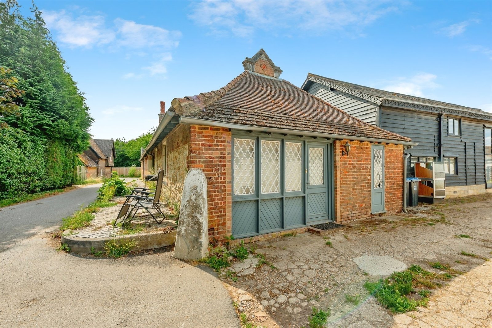 This Surrey home hides a surprise behind its doors with a ground-floor playspace and pole alongside cozy bedrooms, patio and charm, priced at £375,000.