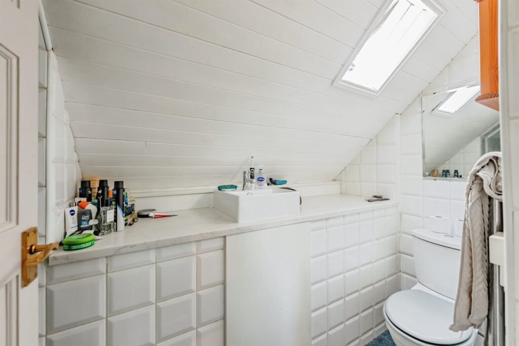 This Surrey home hides a surprise behind its doors with a ground-floor playspace and pole alongside cozy bedrooms, patio and charm, priced at £375,000.
