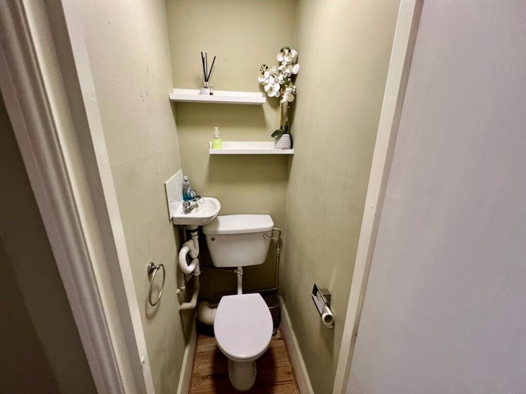Charming Notting Hill studio with ornate ceiling, mock fireplace and mezzanine bedroom rents for £1,520 a month but comes with limited headroom and quirky layout.