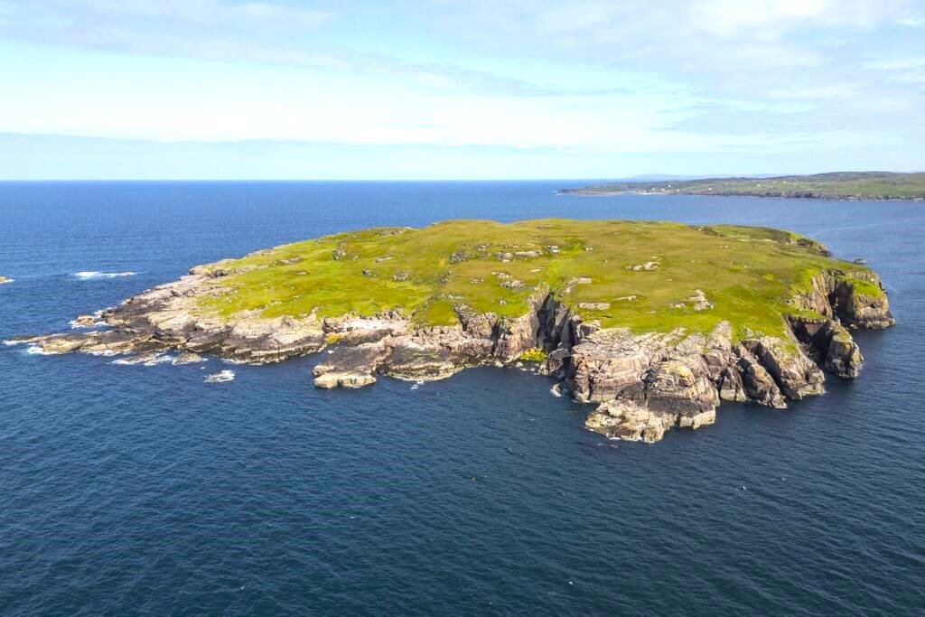 Mullagrach Island in Scotland’s Summer Isles is now £400,000, offering 88 acres of rugged beauty, eco cabin, wildlife conservation and total off-grid seclusion.