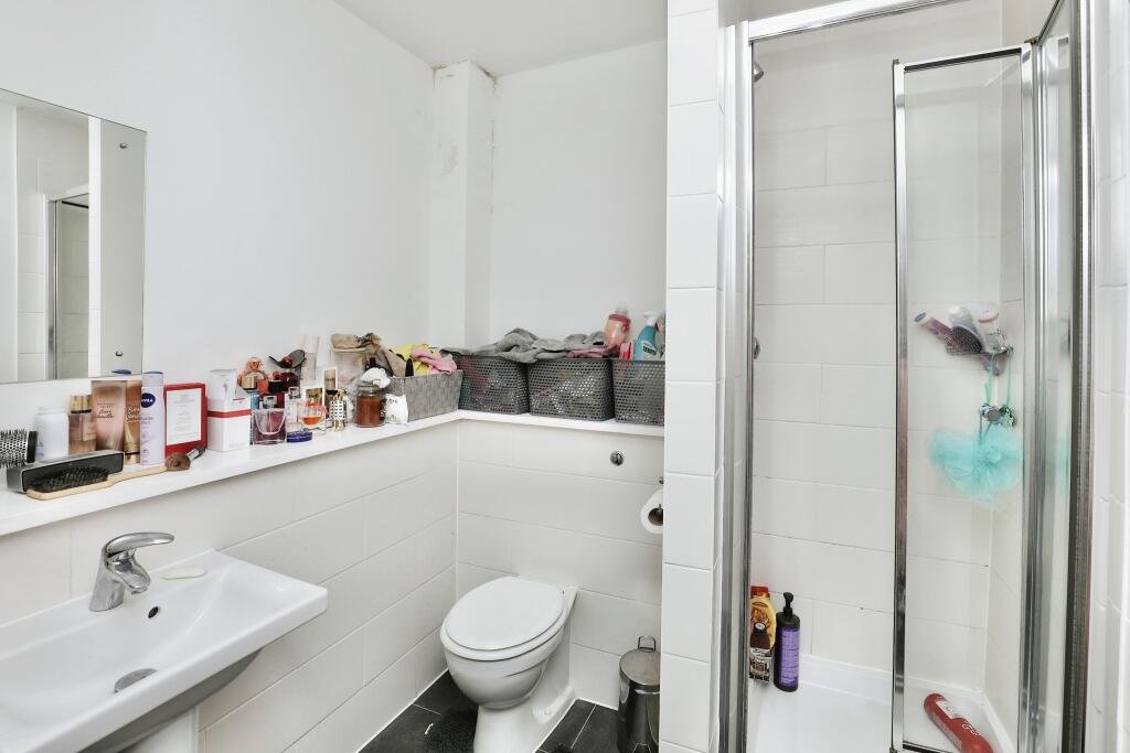 A £10,000 student flat in Liverpool offers ensuite living, shared lounge and kitchen, gym access and 24 hour concierge with mortgage repayments under £50 a month.