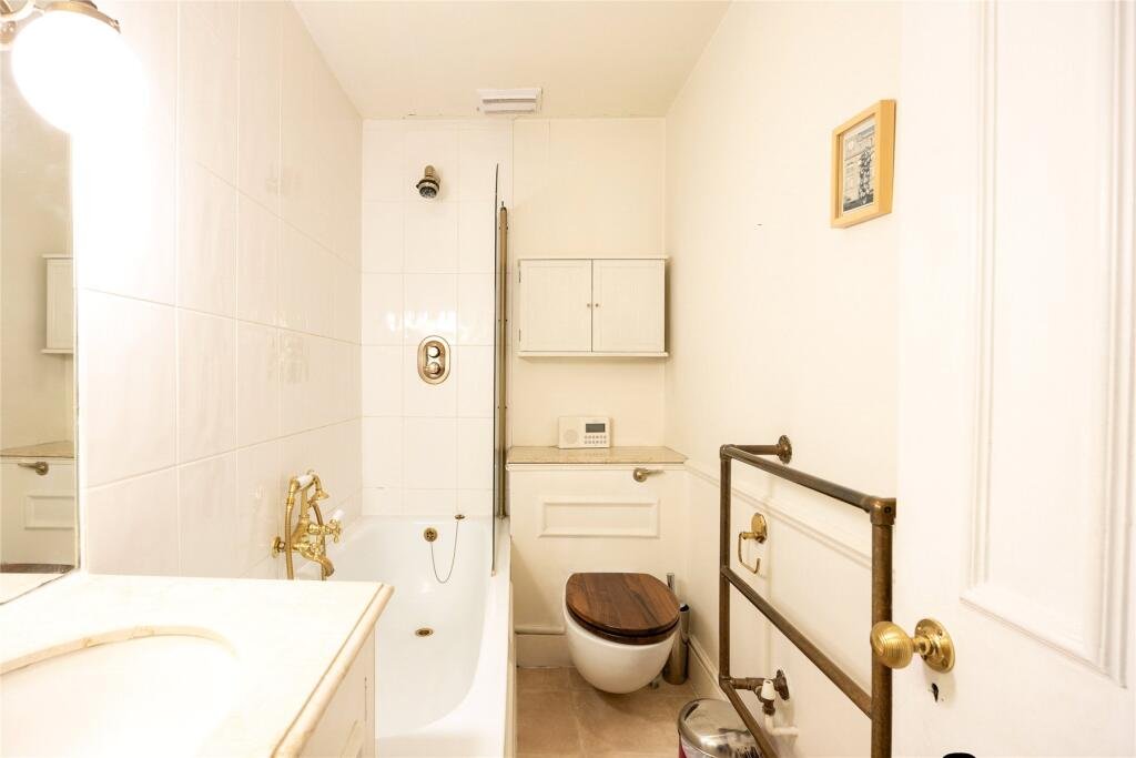 Chelsea duplex near Sloane Square listed at £595k with two bedrooms, conservatory and gardens but just 19 years left on the leasehold making it a rare risky bargain.