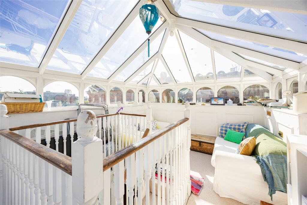 Chelsea duplex near Sloane Square listed at £595k with two bedrooms, conservatory and gardens but just 19 years left on the leasehold making it a rare risky bargain.