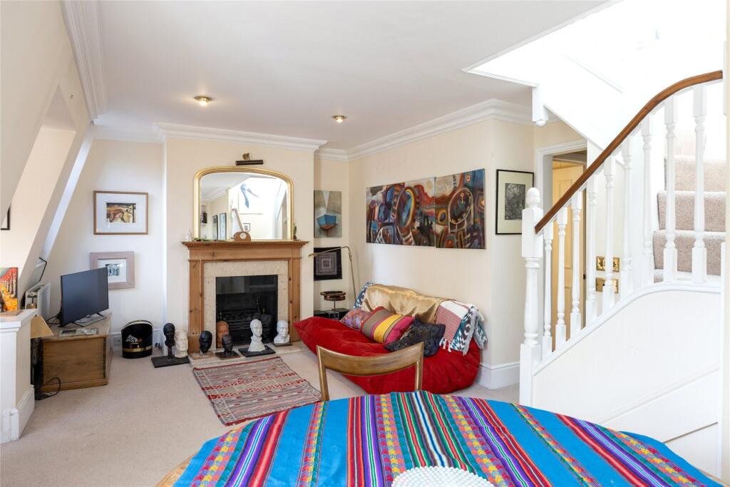 Chelsea duplex near Sloane Square listed at £595k with two bedrooms, conservatory and gardens but just 19 years left on the leasehold making it a rare risky bargain.