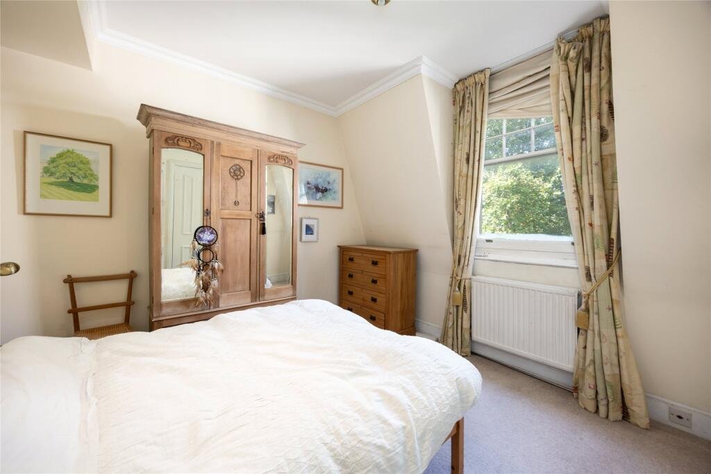 Chelsea duplex near Sloane Square listed at £595k with two bedrooms, conservatory and gardens but just 19 years left on the leasehold making it a rare risky bargain.