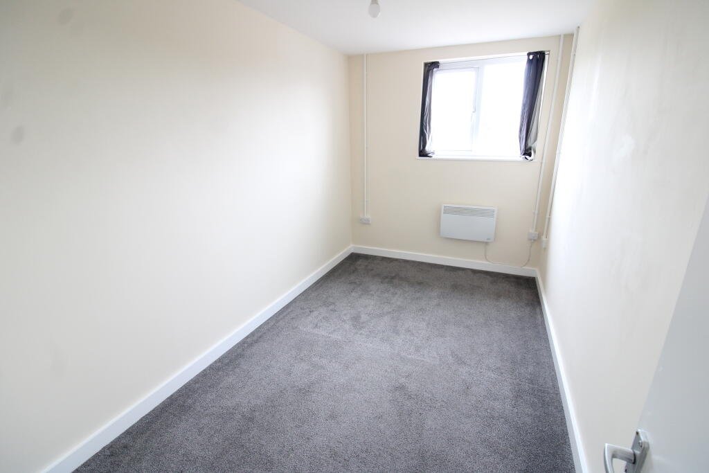 Three bedroom flat above Tim Hortons drive thru in Weston Super Mare for £1400 a month offers fresh interiors, lounge and bathroom with town and seafront access.