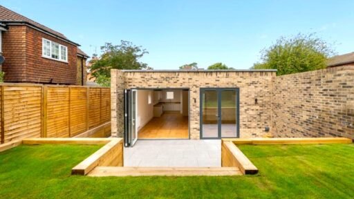 A tiny one bedroom brick cabin in Effingham is on sale for £475k, over £200k above the UK average, offering modern design, a private garden and eco friendly features.