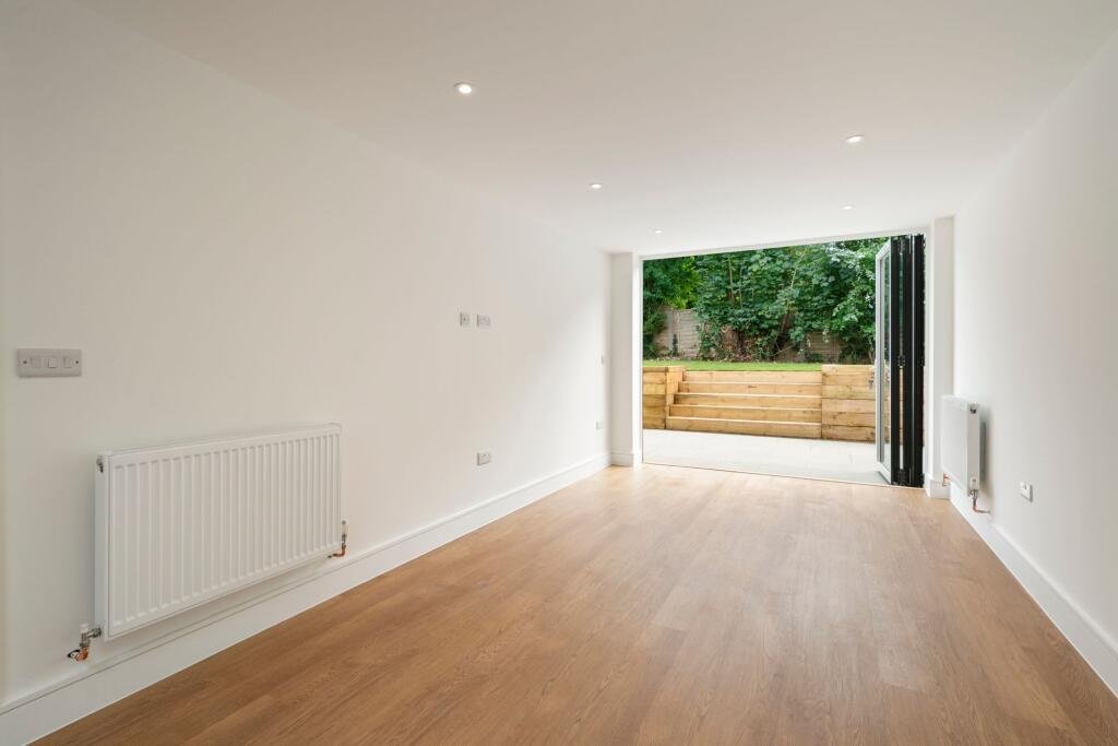 A tiny one bedroom brick cabin in Effingham is on sale for £475k, over £200k above the UK average, offering modern design, a private garden and eco friendly features.
