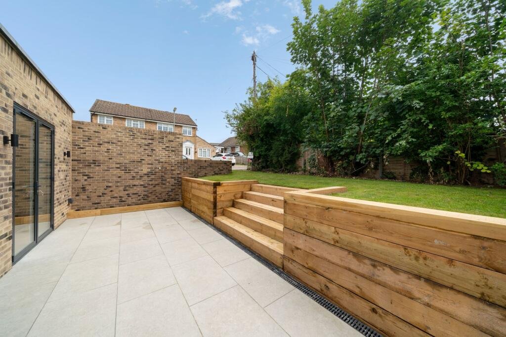 A tiny one bedroom brick cabin in Effingham is on sale for £475k, over £200k above the UK average, offering modern design, a private garden and eco friendly features.