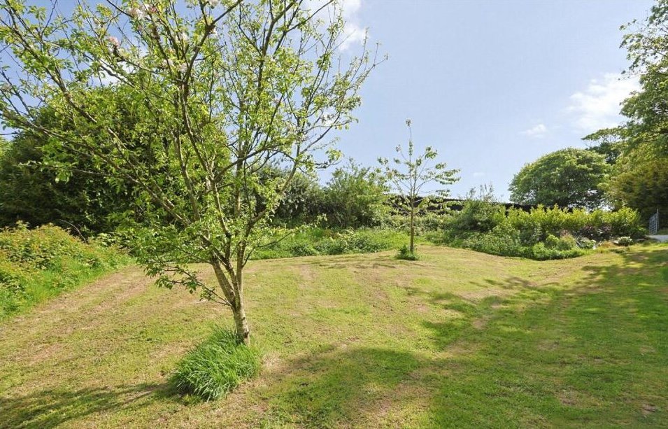 Charming £100,000 wooden shepherd’s hut near Penryn offers meadowland, pond, log fire and stunning countryside views, ideal as a retreat, glamping or holiday let.