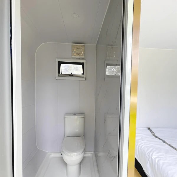 Tiny houses for just over £10k are now available online. Chery Industrial offers a flat-pack style cabin with bed, shower, and workspace delivered to your door.
