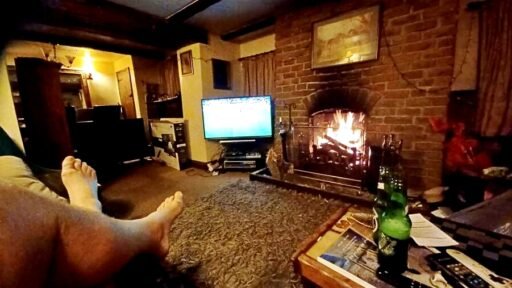 Charming 17th century Dorset cottage for £785,000 with four bedrooms, hot tub, Tiki bar and grazing land - but quirky photos reveal bare feet on show in the listing.