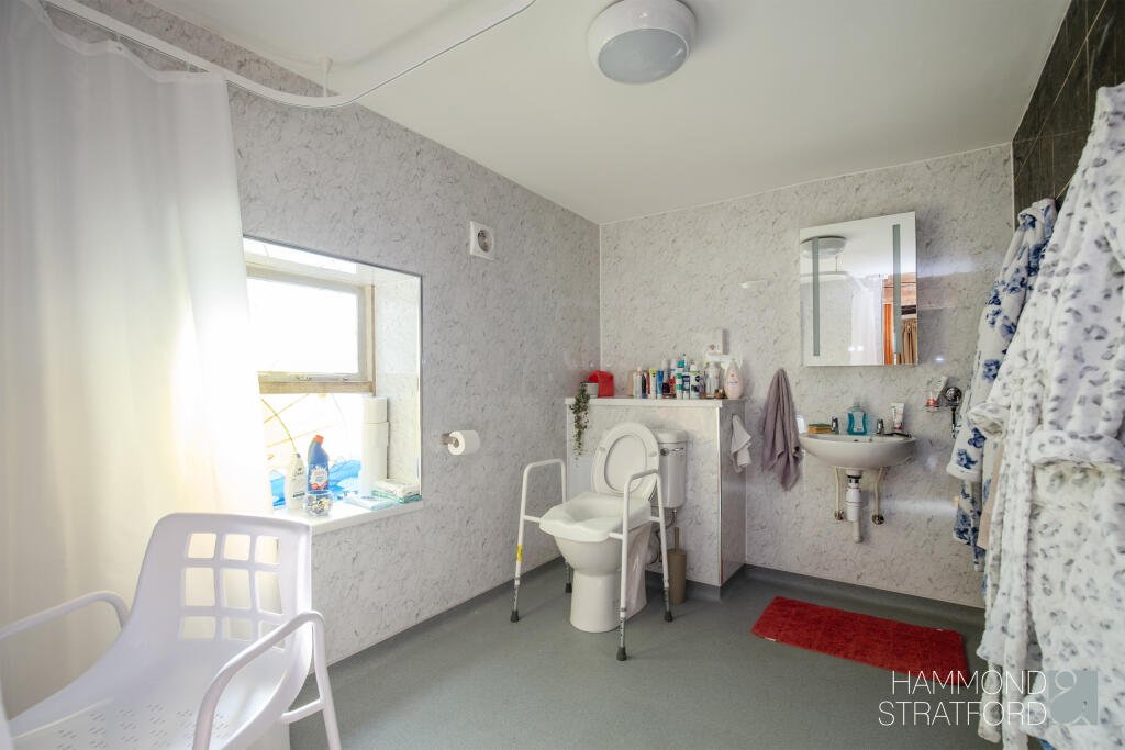 A £300,000 two-bedroom cottage in Norfolk offers rustic charm and woodland seclusion just feet from train tracks, blending period character with unique rural living.