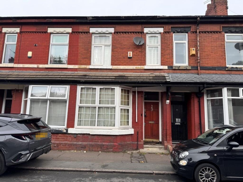 A Manchester student house with six bedrooms is on auction for £200,000, featuring private kitchens in each room near the University of Manchester and the famous Curry Mile.