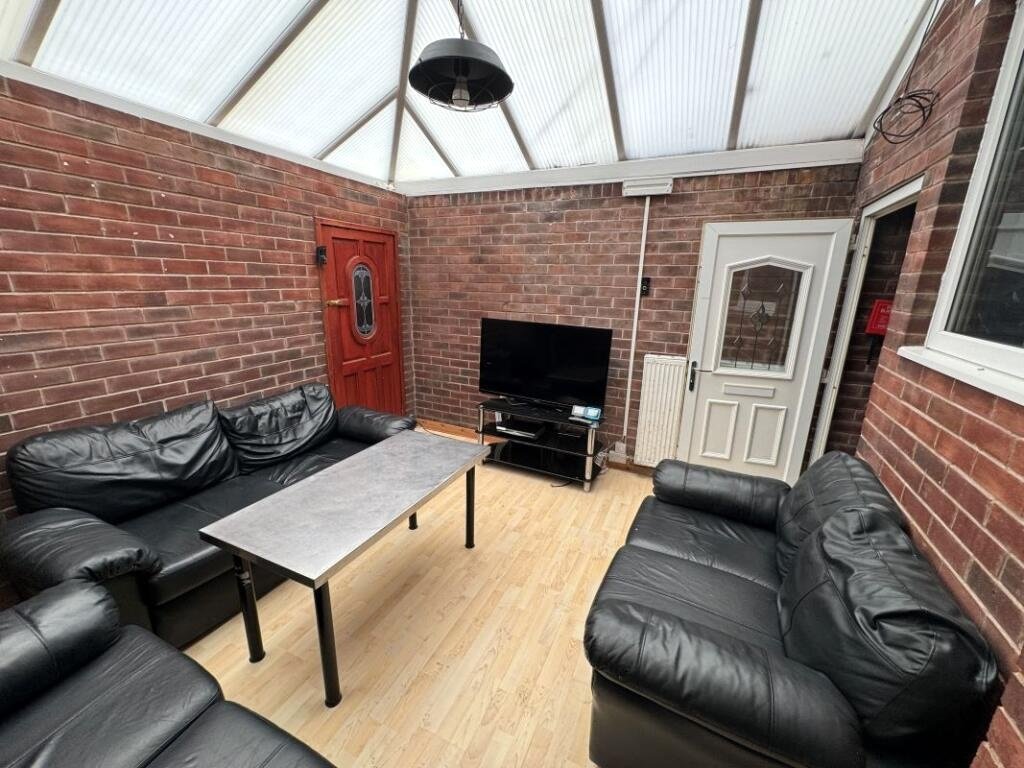A Manchester student house with six bedrooms is on auction for £200,000, featuring private kitchens in each room near the University of Manchester and the famous Curry Mile.