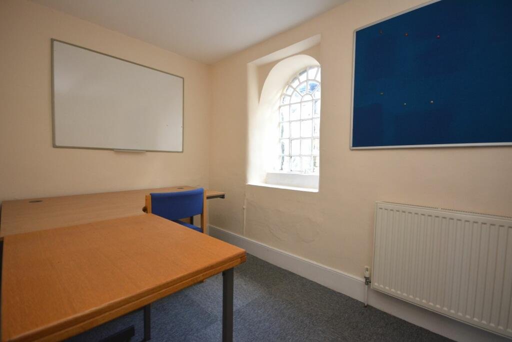 A former police station in Dolgellau with four original cells and three courtyards is on the market for £95,000, offering quirky charm and conversion potential.