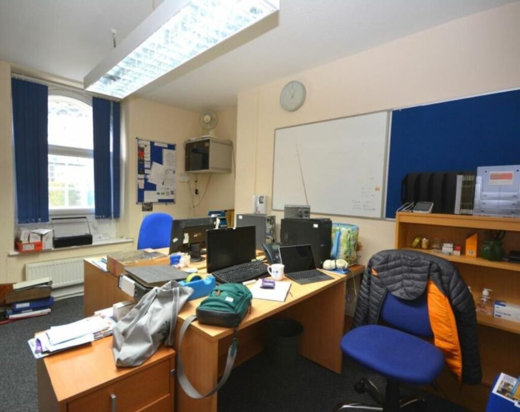 A former police station in Dolgellau with four original cells and three courtyards is on the market for £95,000, offering quirky charm and conversion potential.