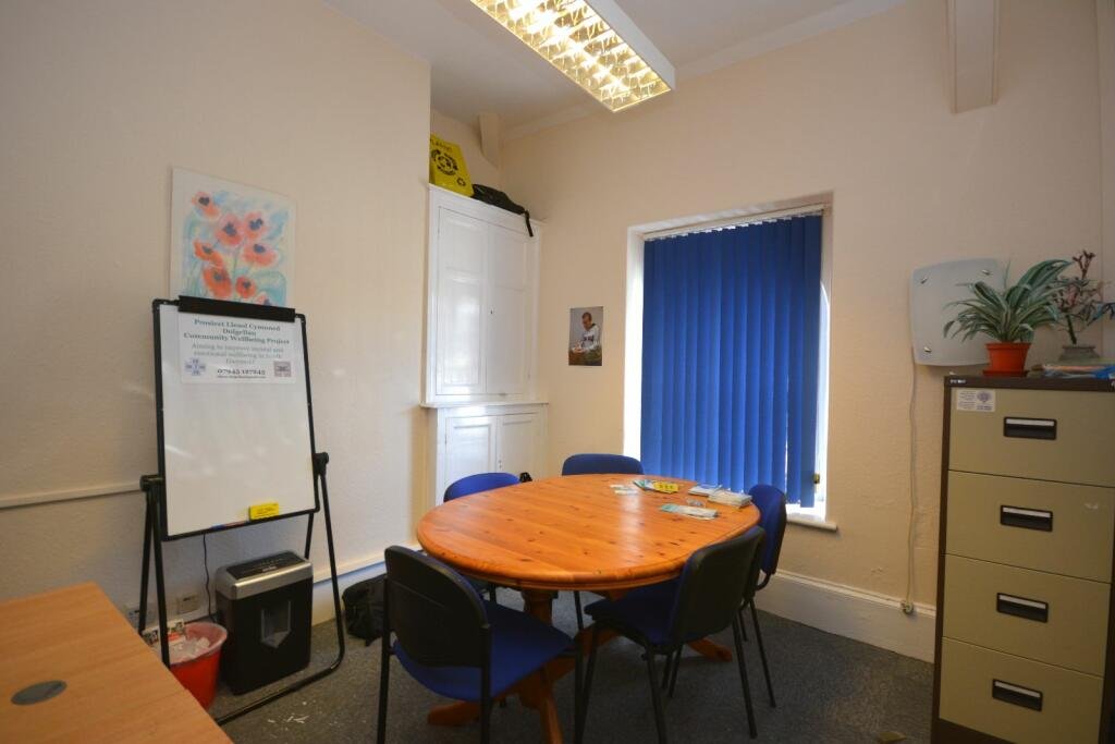 A former police station in Dolgellau with four original cells and three courtyards is on the market for £95,000, offering quirky charm and conversion potential.